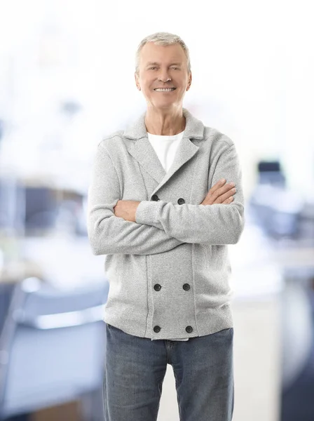 Man with arms crossed standing — Stock Photo, Image