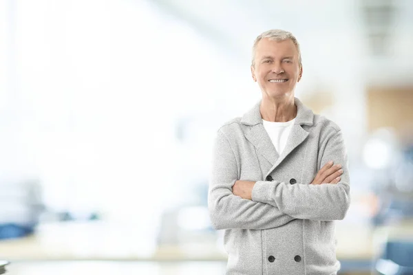 Businessman standing in the office — Stock Photo, Image