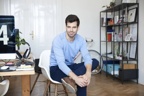 Designer sitting in his workstation — Stock Photo, Image