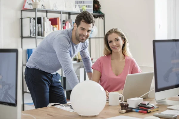 Creative people using laptop — Stock Photo, Image