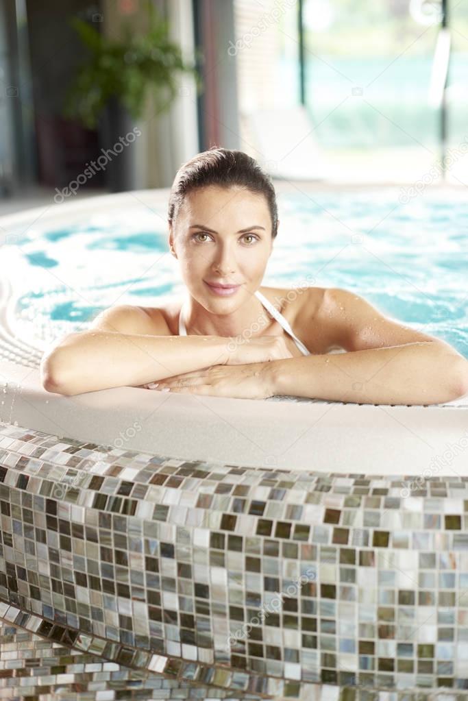  woman relaxing in jacuzzi 