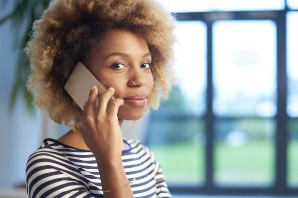 businesswoman using her cell phone