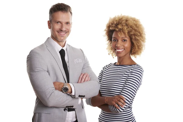 Businesswoman and a senior businessman standing — Stock Photo, Image