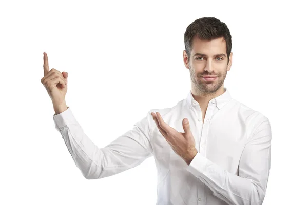 Man raising his hand and pointing up — Stock Photo, Image