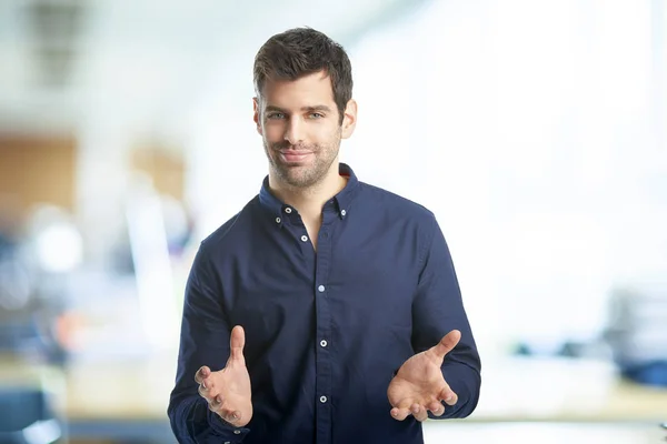 Businessman standing with his arms raised a — Stock Photo, Image