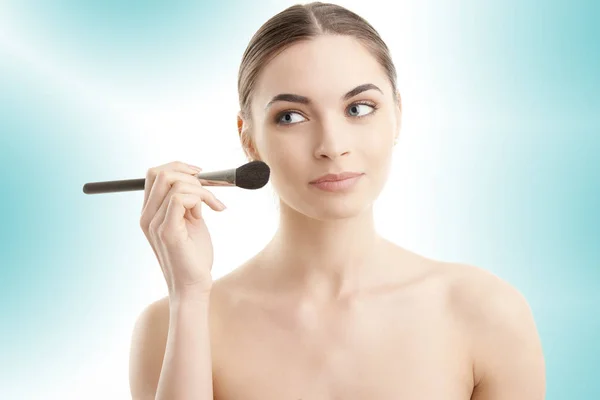 Close Young Woman Holding Brush Her Hand Applying Makeup Isolated — Stock Photo, Image