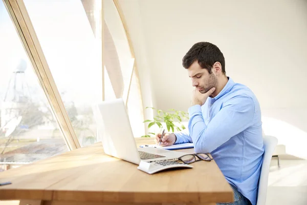 Portrait Young Businessman Hand His Chin Sitting Front Laptop Doing — Stock Photo, Image