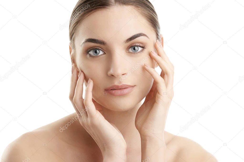 Young woman with healthy glowing skin