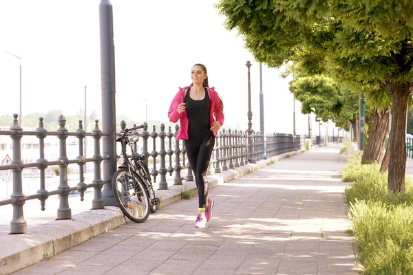 Full Length Shot Young Woman Running Street Her Morning Run — Stock Photo, Image