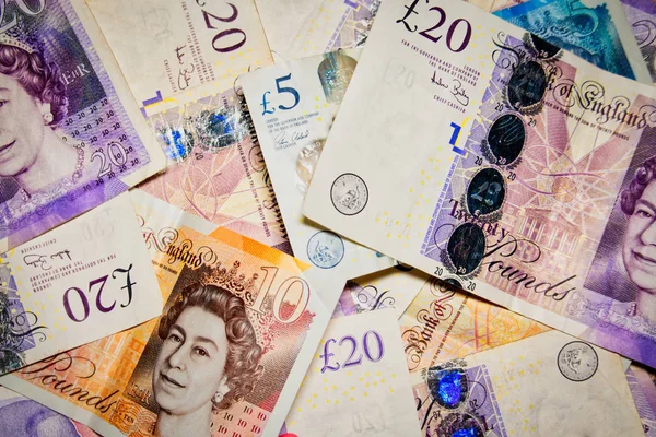 Contexte Monnaie britannique conceptualisée par des notes rapprochées Royaume-Uni — Photo