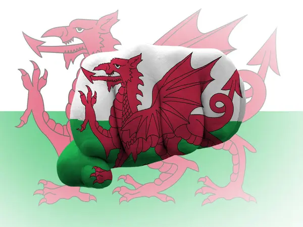 Welshe vlag met vuist die macht vertegenwoordigt — Stockfoto