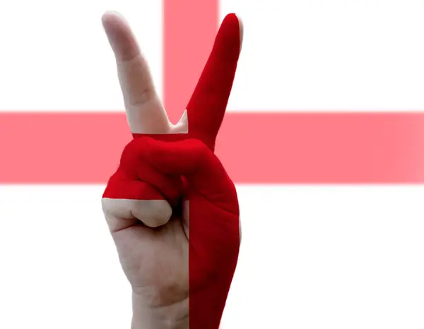 George Cross English Flag hand in Victory Pose — стокове фото