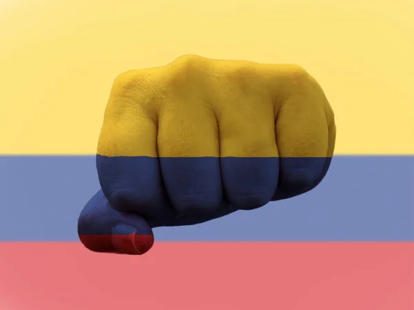 Columbia Flag pintado sobre puño humano que representa el poder — Foto de Stock