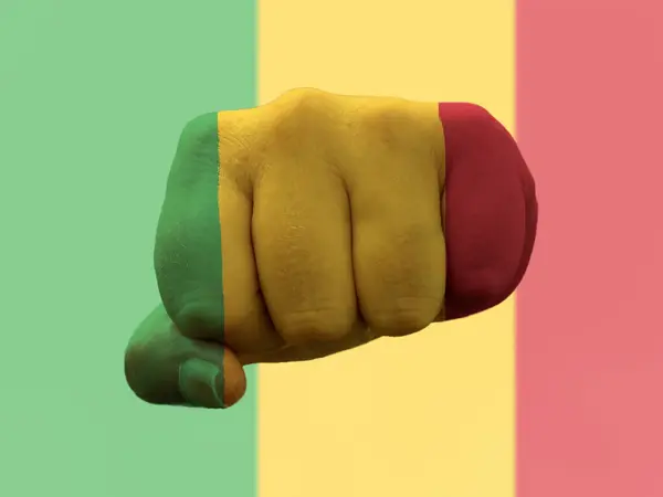 Mali Flag painted on human fist representing power — Stock Photo, Image