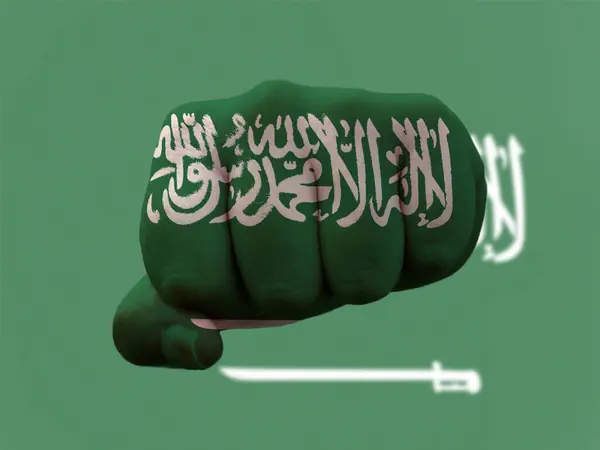 Arábia Saudita Bandeira pintada em punho humano representando o poder — Fotografia de Stock