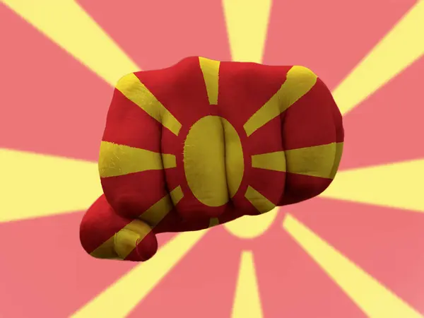 Macedonia Bandeira pintada em punho humano representando o poder — Fotografia de Stock