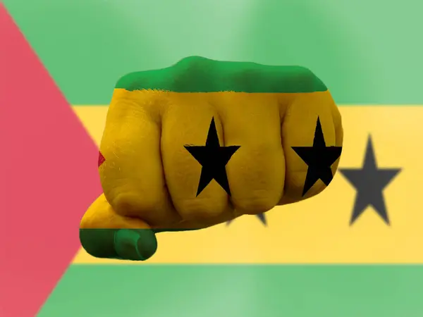 Sao Tome and Principe Flag painted on human fist representing power — Stock Photo, Image