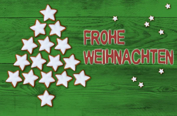 Cinnamon stars Christmas tree Frohe Weihnachten (in german Merry — Stock Fotó