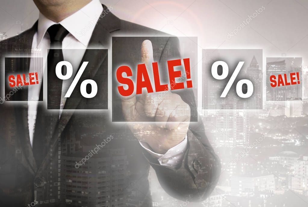 SALE Businessman with city background concept