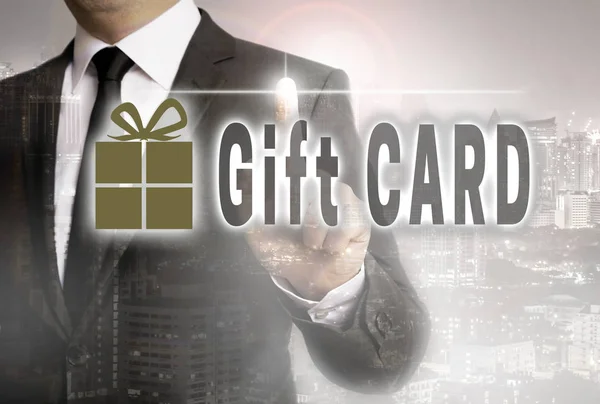 Gift card is shown by businessman concept — Stock Photo, Image