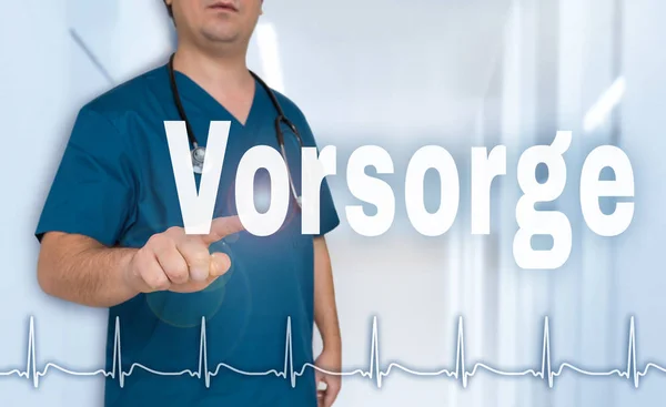 Vorsorge (in german Preventive) doctor shows on viewer with hear — Stock Photo, Image