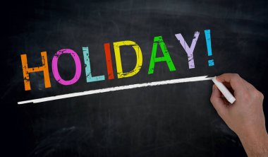 Tatil tahtaya el tarafından yazılmış