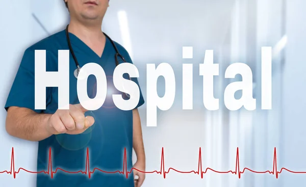 Hospital doctor showing on viewer with heart rate concept — Stock Photo, Image