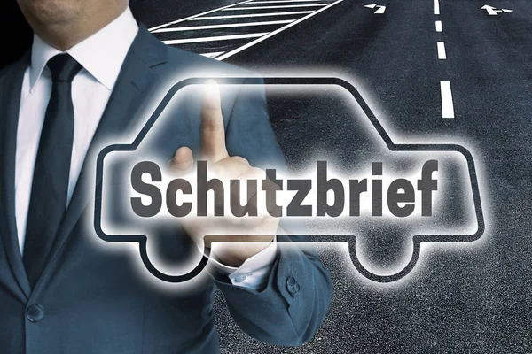 Schutzbrief (en alemán Carta de protección) Pantalla táctil del coche es ope —  Fotos de Stock