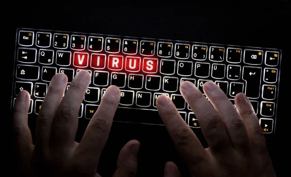 Virus keyboard is operated by Hacker — Stock Photo, Image