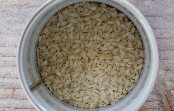 Arroz Risotto em uma caixa vista superior — Fotografia de Stock