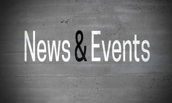 Nieuws en evenementen op betonnen wand concept achtergrond — Stockfoto