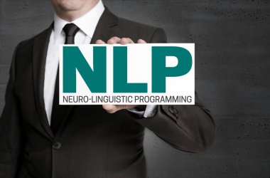 NLP işareti işadamı tarafından düzenlenmektedir