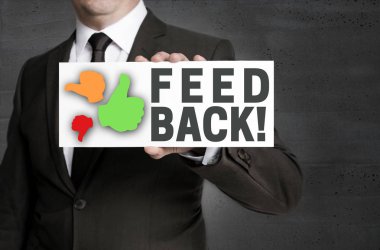 Geribildirim işareti işadamı tarafından düzenlenmektedir