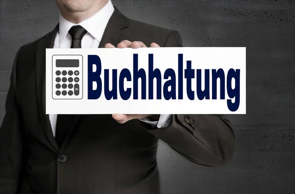 Buchhaltung (in german Accounting) signboard is held by business — Stock Photo, Image