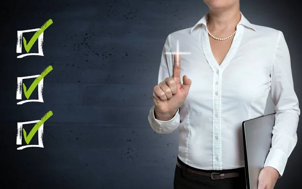 Checklist touchscreen is shown by businesswoman — Stock Photo, Image