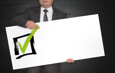 Denetim listesi poster işadamı tarafından düzenlenmektedir