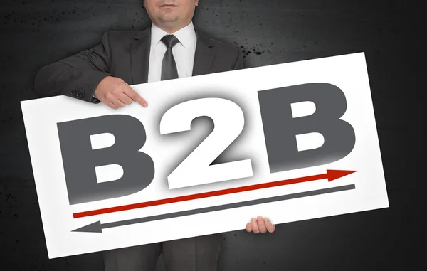 Affiche B2B tenue par un homme d'affaires — Photo