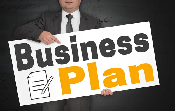 Cartaz do plano de negócios é realizada pelo empresário — Fotografia de Stock