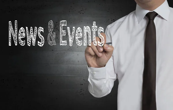 News and Events is written by businessman on screen — Stock Photo, Image