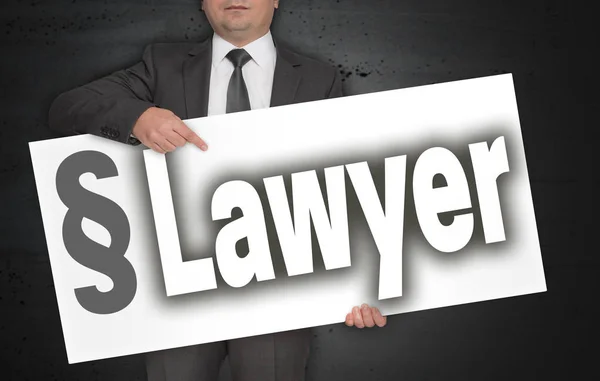 Адвокатский плакат держит бизнесмен — стоковое фото