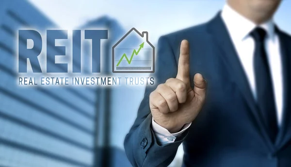 Il concetto di REIT è mostrato dall'imprenditore — Foto Stock