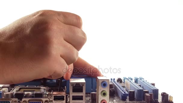 Mens hands with screwdriver repairing motherboard isolated on white — Stock Video