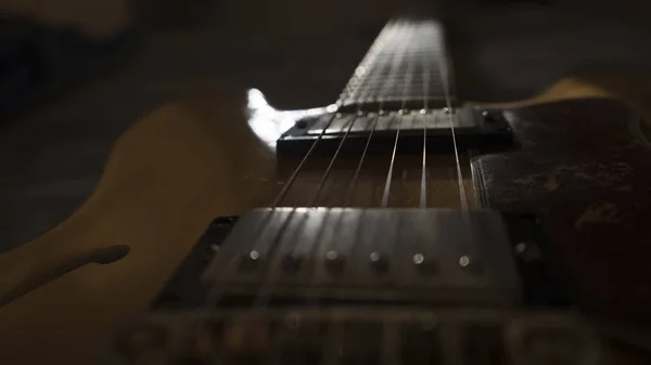 Vintage archtop guitar in natural maple close-up back light high angle view — Stock Photo, Image