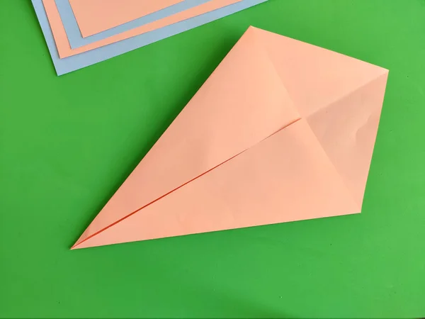 Origami step by step. How to make a paper bunny for Easter greetings