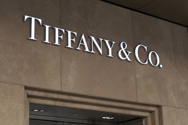 Illuminated Tiffany & Co script sign — ストック写真