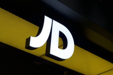 Brisbane, Queensland, Australia - 17th January 2020 : View of an illuminated JD Sports sign hanging at the shop entrance in Brisbane. JD Sports is a sports-fashion retail company based in Bury, UK