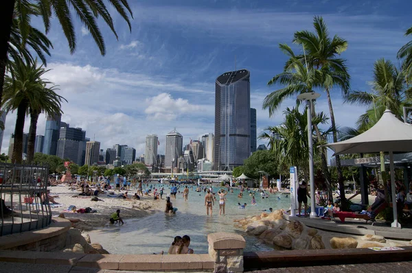 Brisbane, Queensland, Australia - 27th January 2020 : View of South Bank artificial street beach and pools on a sunny day with many tourists enjoying a bath in fresh water