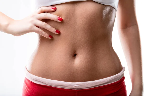 Closeup of a good shaped woman's flat belly