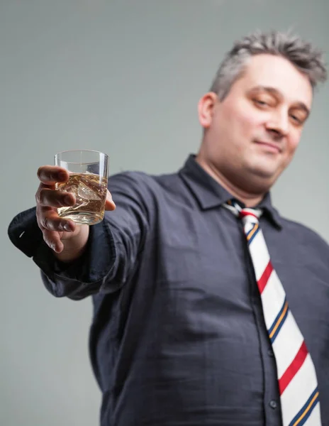 Man offering some liquid courage — Stock Photo, Image