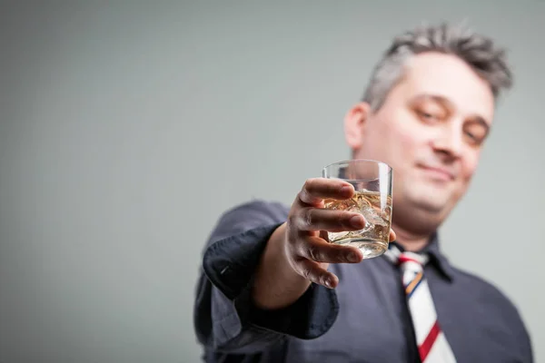 Man offering some liquid courage — Stock Photo, Image